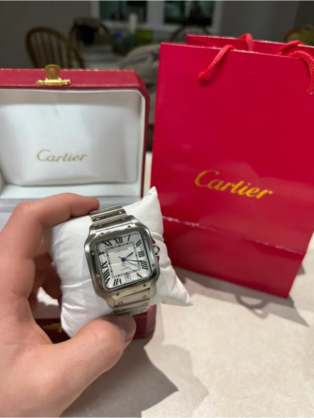 Cartier Watch with White Dial and Blue Hands